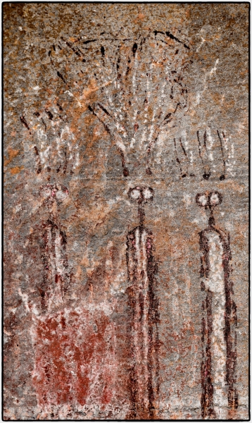 \"Specters\"  \'The Rainman Panel\' near Ferron Utah includes these facinating figures wearing elaborate headresses.  They are seriously faded but D-Stretch was able to restore much of the pigment\'s original vibrancy.